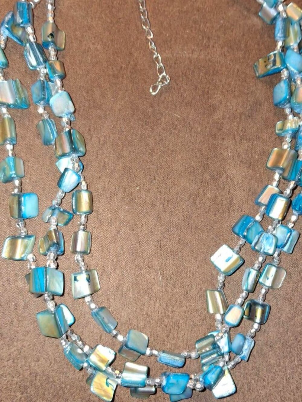shell multistrand layered Blue and silver beaded necklace